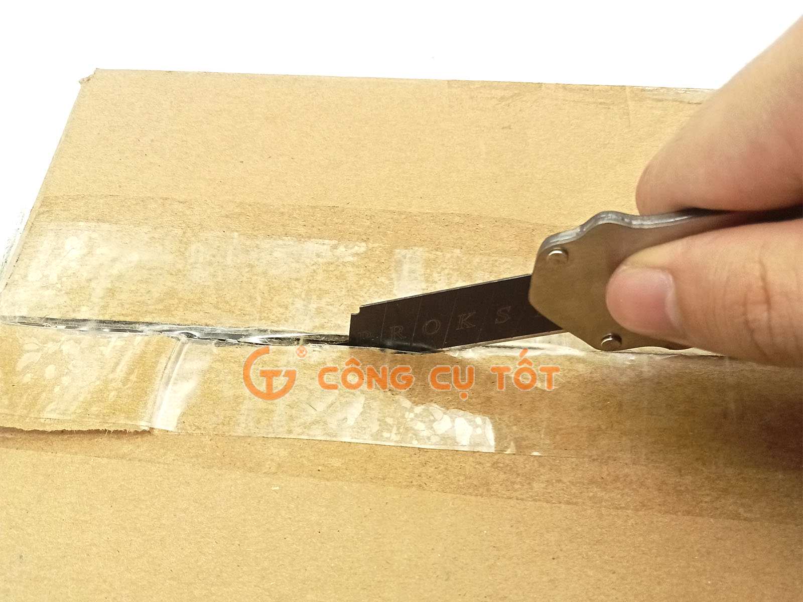 Dao rọc giấy dùng để cắt băng dính