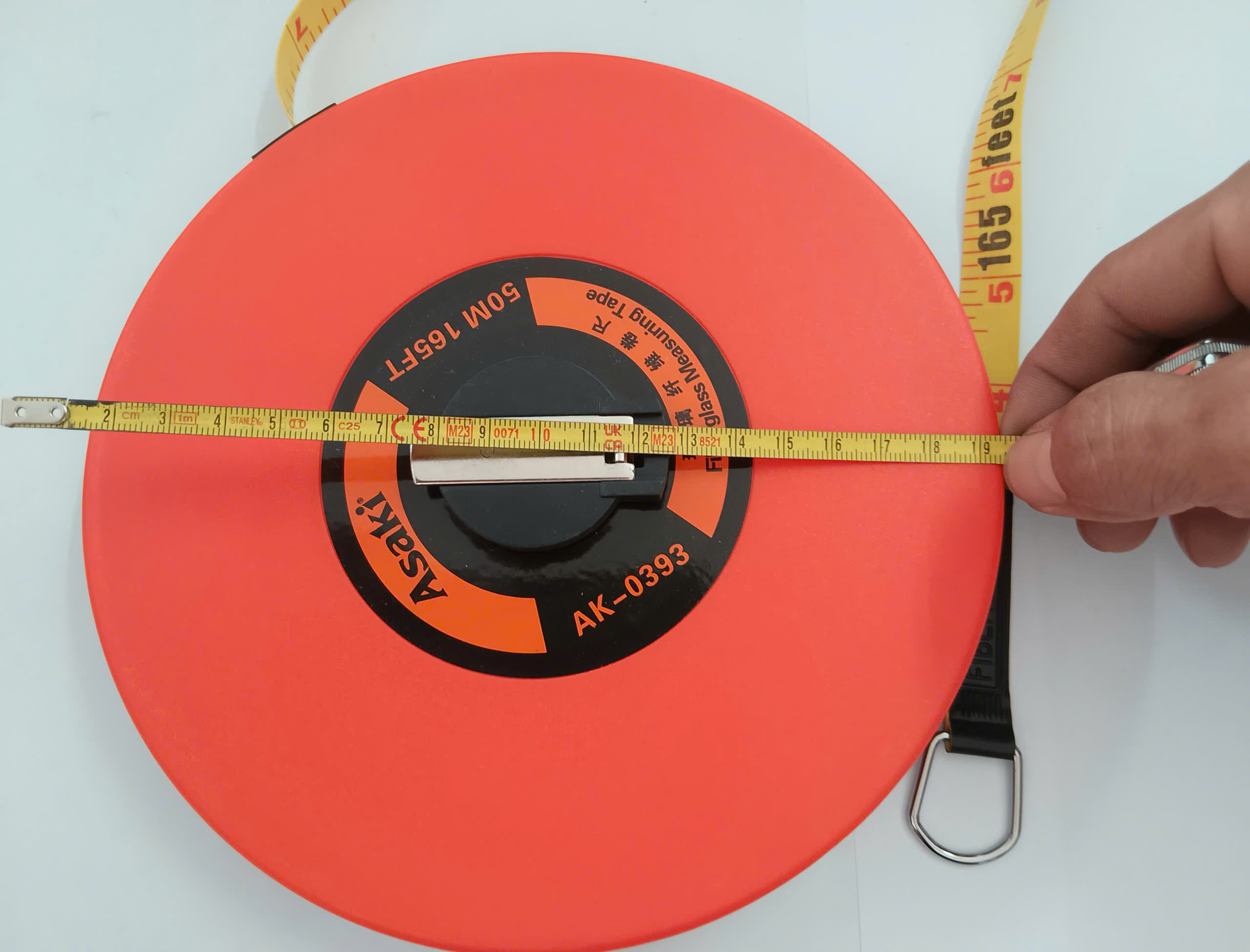 Hình ảnh 7 của mặt hàng Thước dây sợi thủy tinh nền vàng Hệ Inch & Mét - Chịu lực 70kg 50M Asaki AK-0393